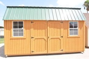 Wood shed with metal roof